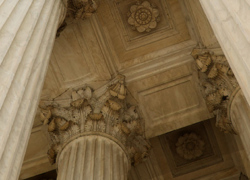 Columns hold up the ceiling of a building